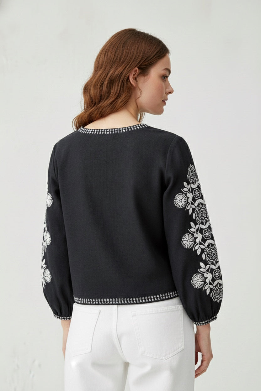 Elegant Black Printed Top with Intricate Floral Accents D7